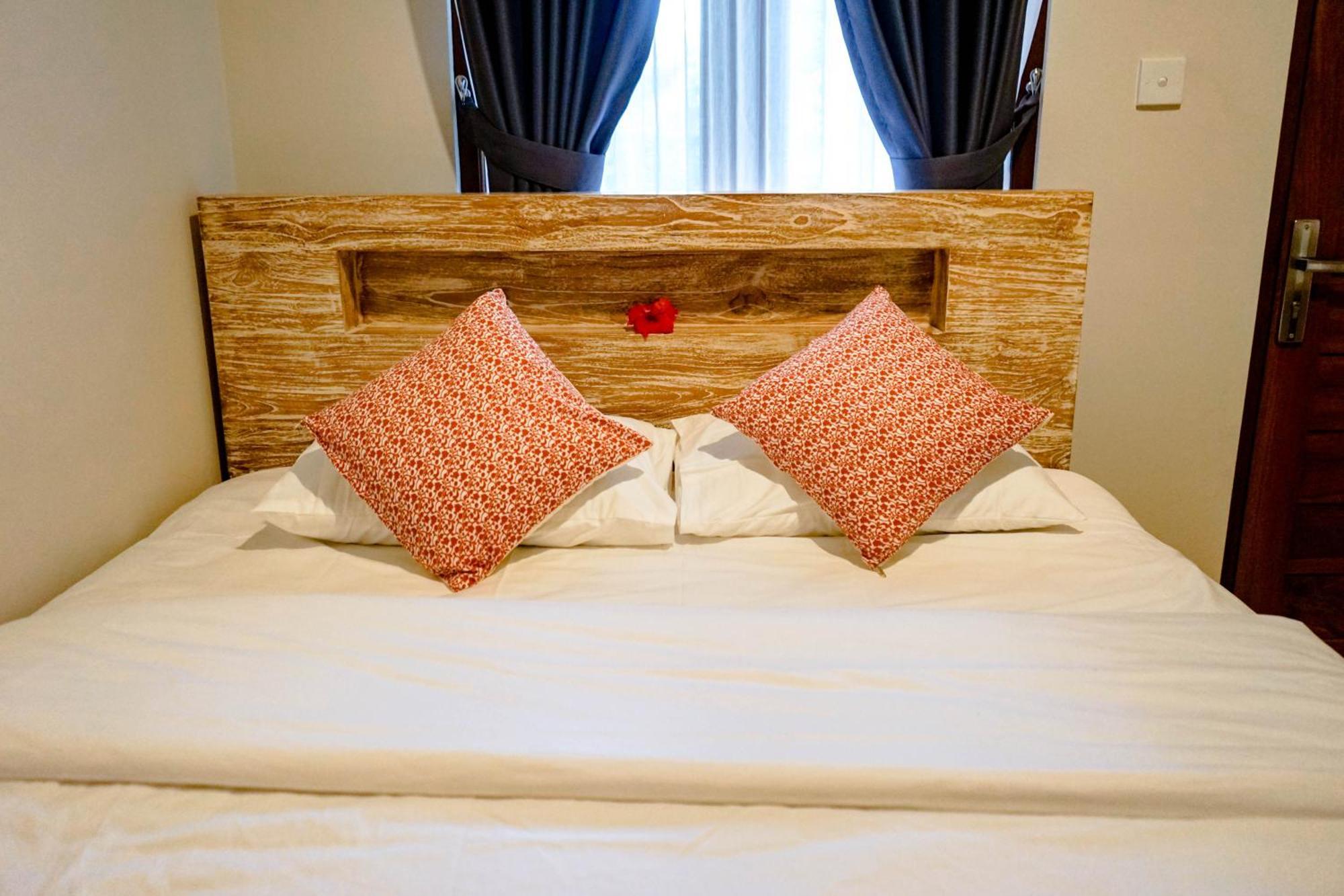 Adhi Homestay Нуса-Дуа Экстерьер фото