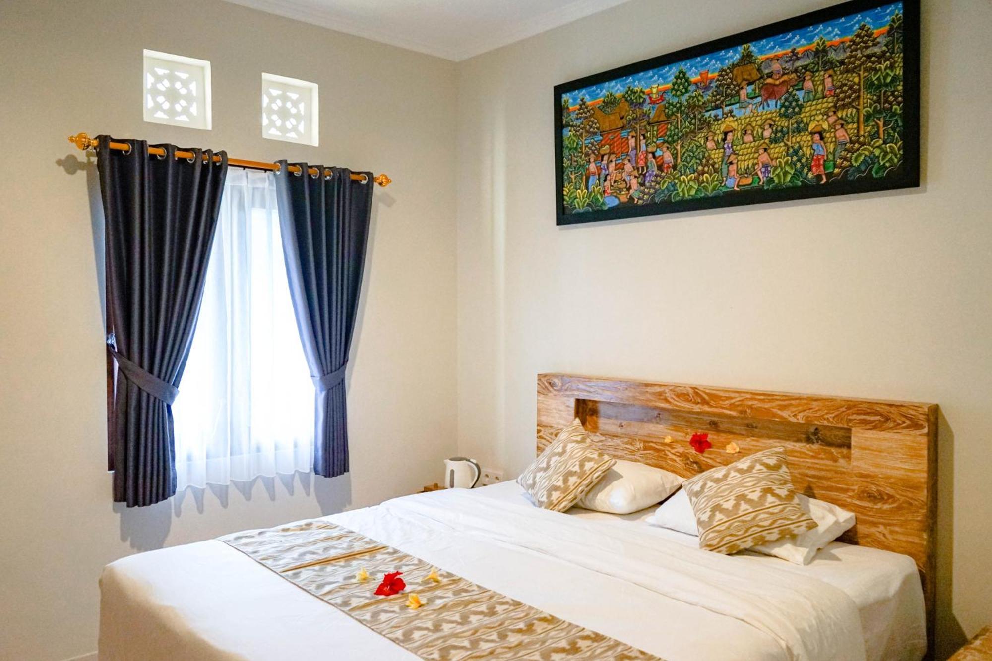 Adhi Homestay Нуса-Дуа Экстерьер фото