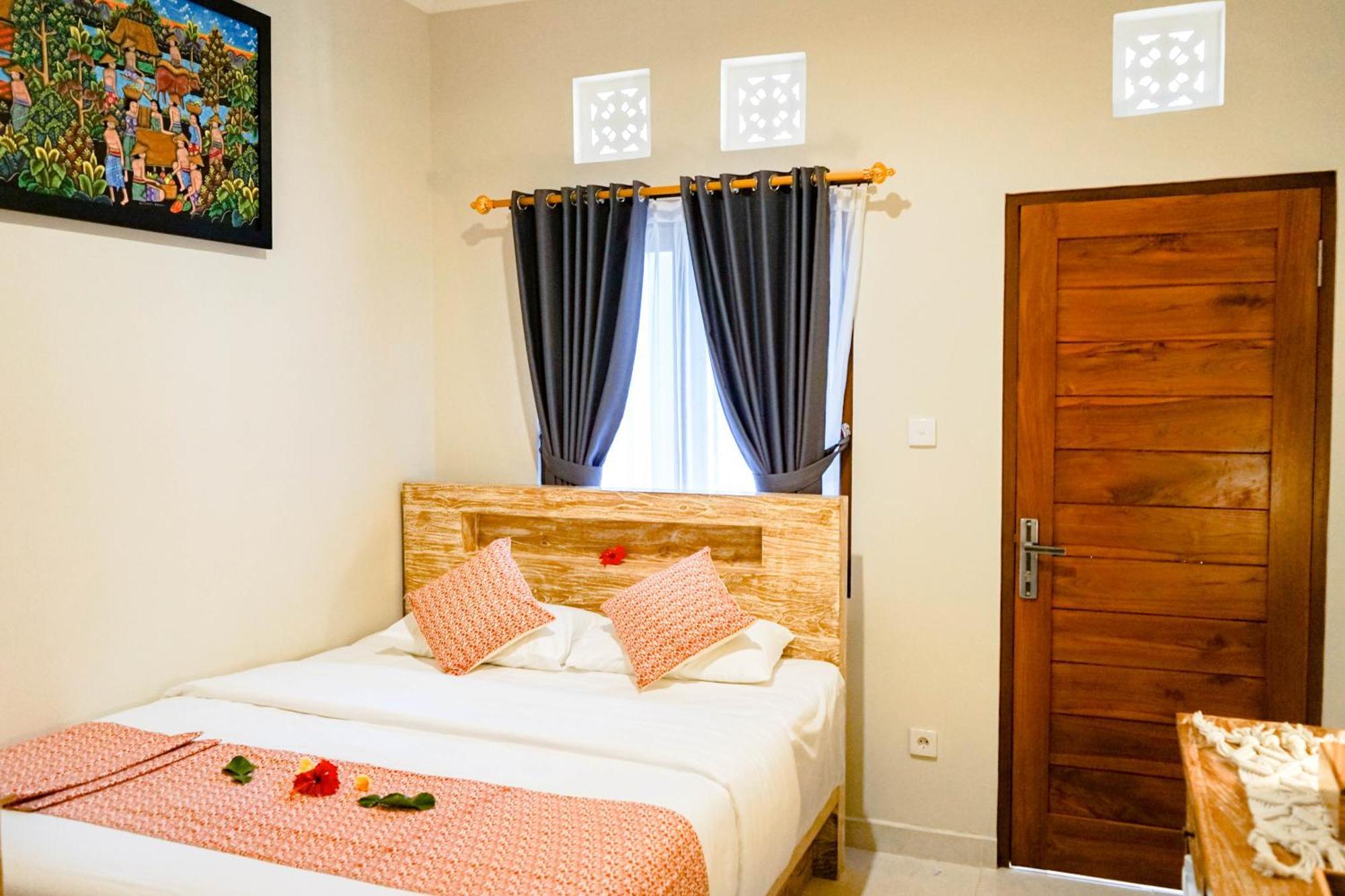 Adhi Homestay Нуса-Дуа Экстерьер фото