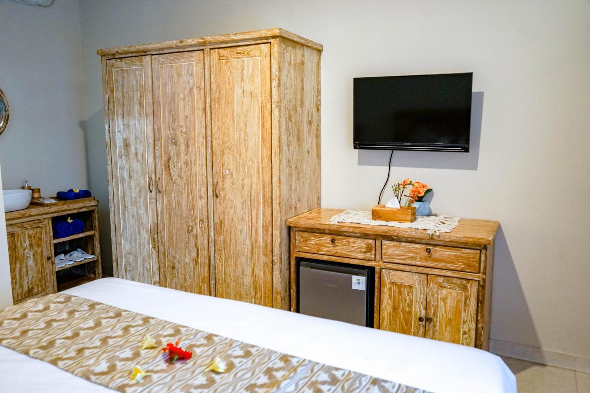 Adhi Homestay Нуса-Дуа Экстерьер фото